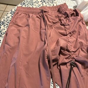 Wine pink parachute like pants from halara